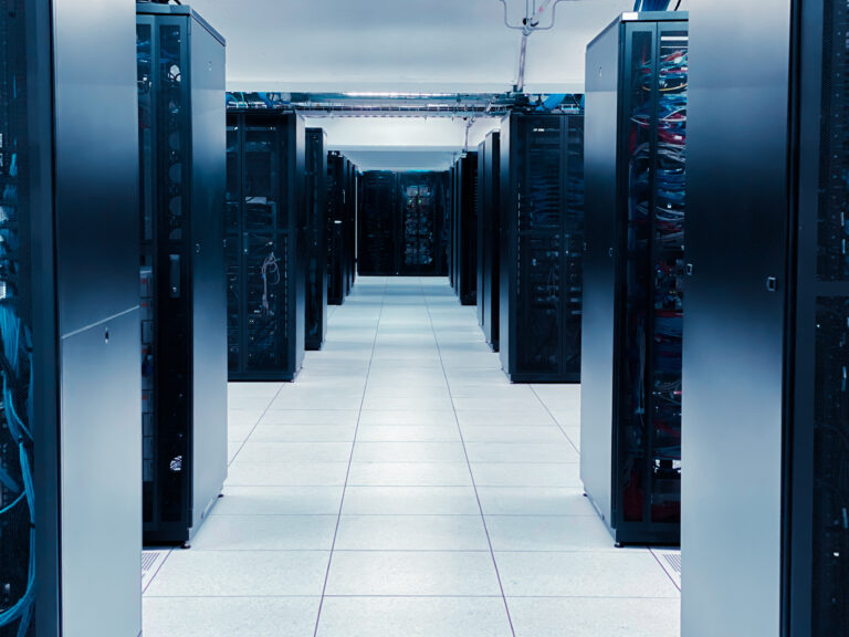 Row of server racks in a data center